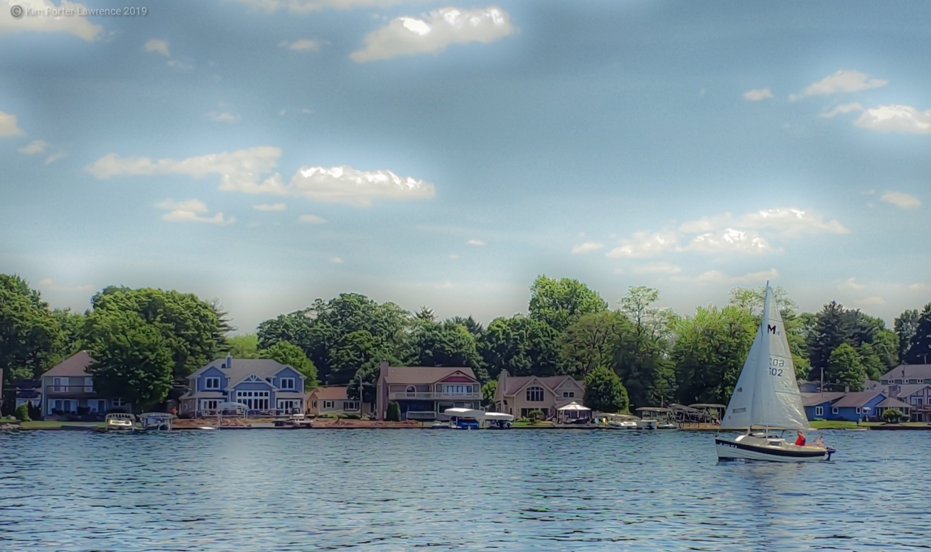 Sailboat on Pine Lake in La Porte Indiana lakefront community